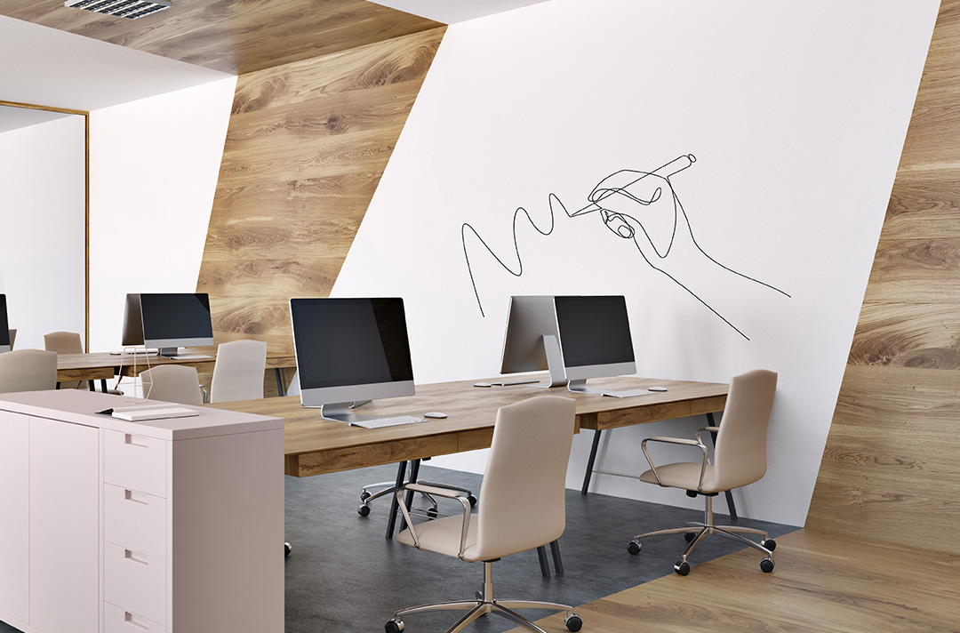 Ein Büroraum mit einem Chameleon Maßgefertigte Whiteboard an der Wand