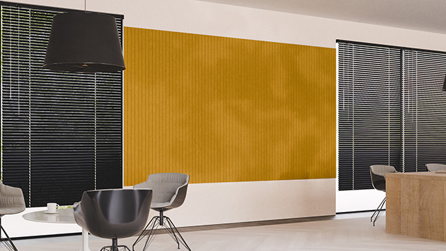 Un espace de bureau avec un Chameleon Sharp Wall Acoustics au mur