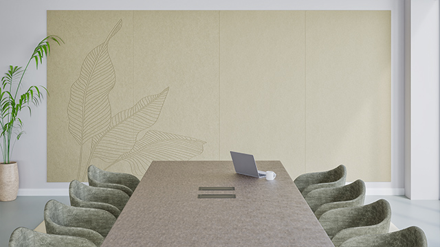 Un espace de bureau avec un Chameleon Creatives Acoustics au mur