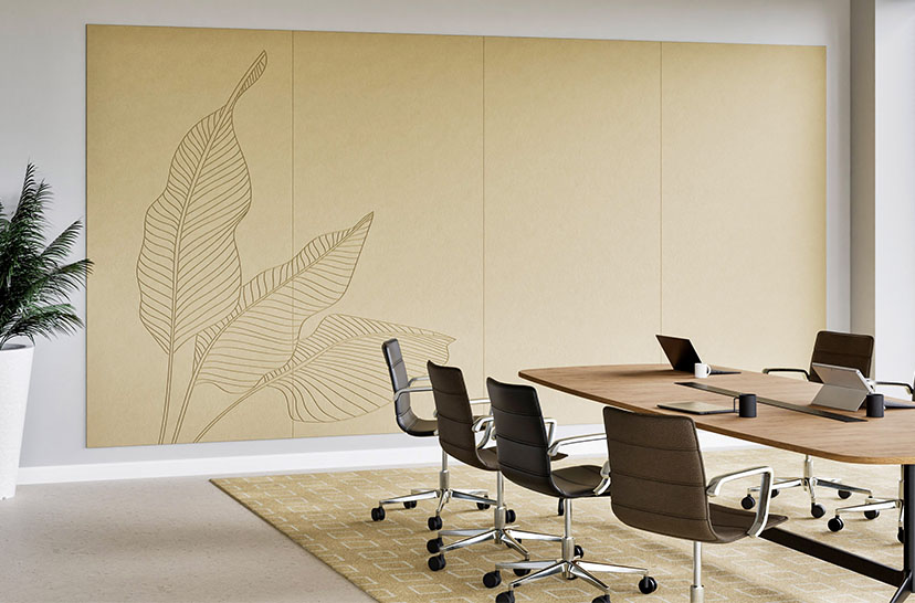 Un espace de bureau avec un Chameleon Creatives Acoustics au mur