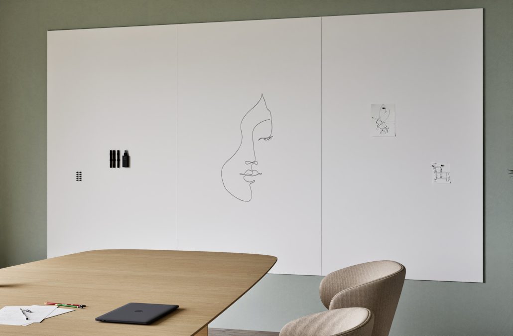Modular ceramic steel whiteboard wall spanning a full office wall