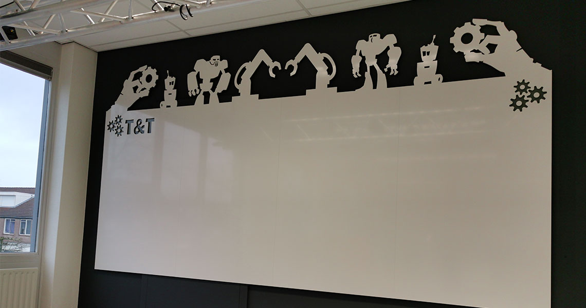 Bespoke whiteboard wall with pendant lighting above a skyline cutout design