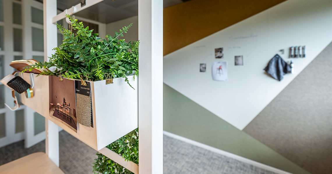 Custom-shaped whiteboard panel with geometric wall detailing
