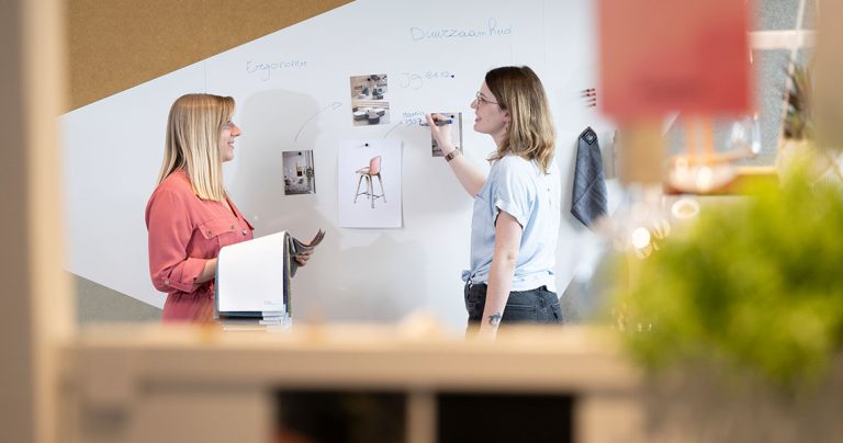 Custom whiteboard wall used during a design review session