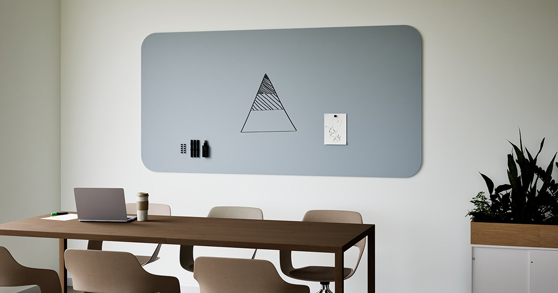 Design whiteboard shown alongside designer office furniture