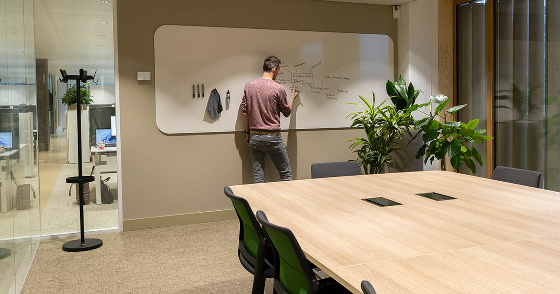 Close-up of a design whiteboard's frameless edge finish