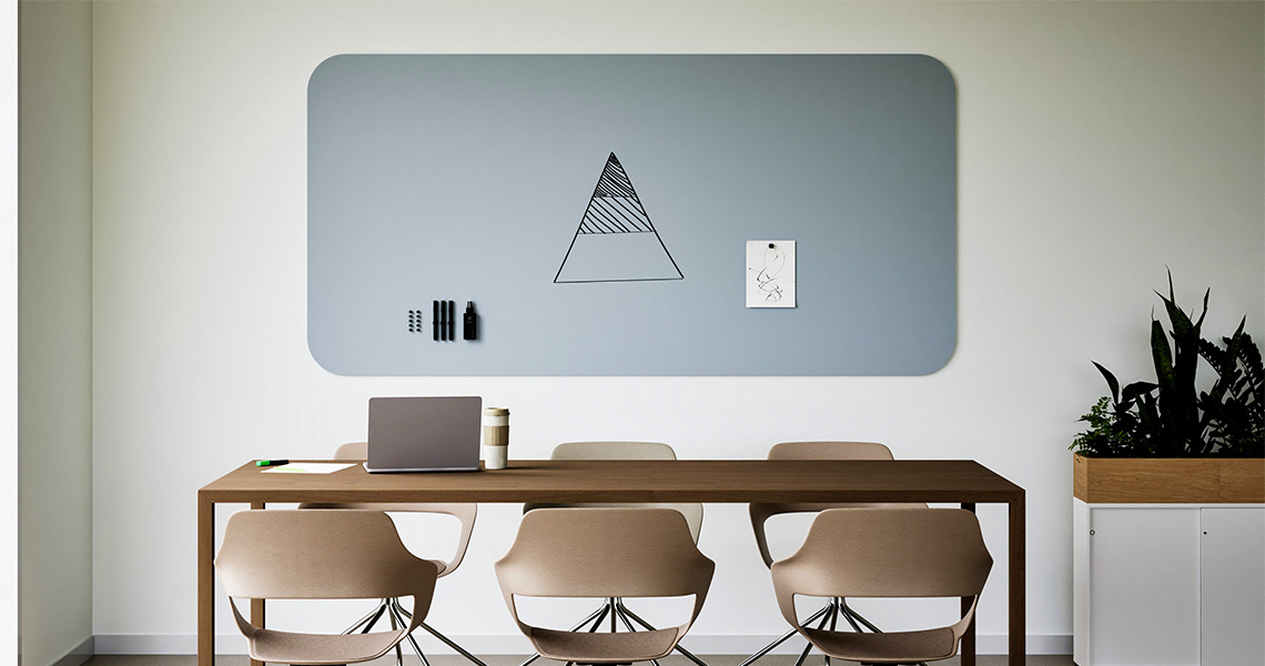 Design whiteboard mounted in a glass-walled meeting room