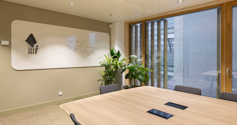 Design whiteboard integrated into a curved interior wall