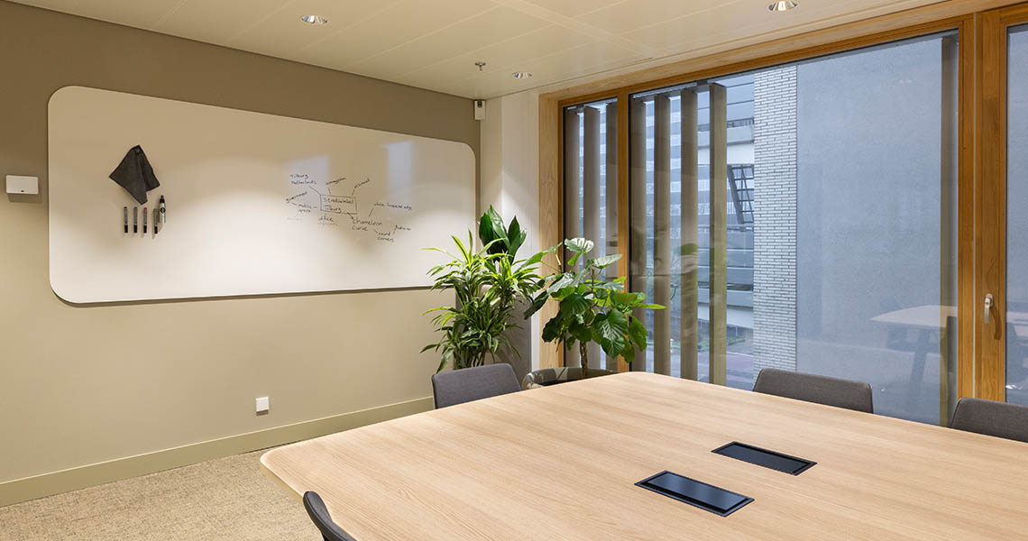 Design whiteboard integrated into a curved interior wall