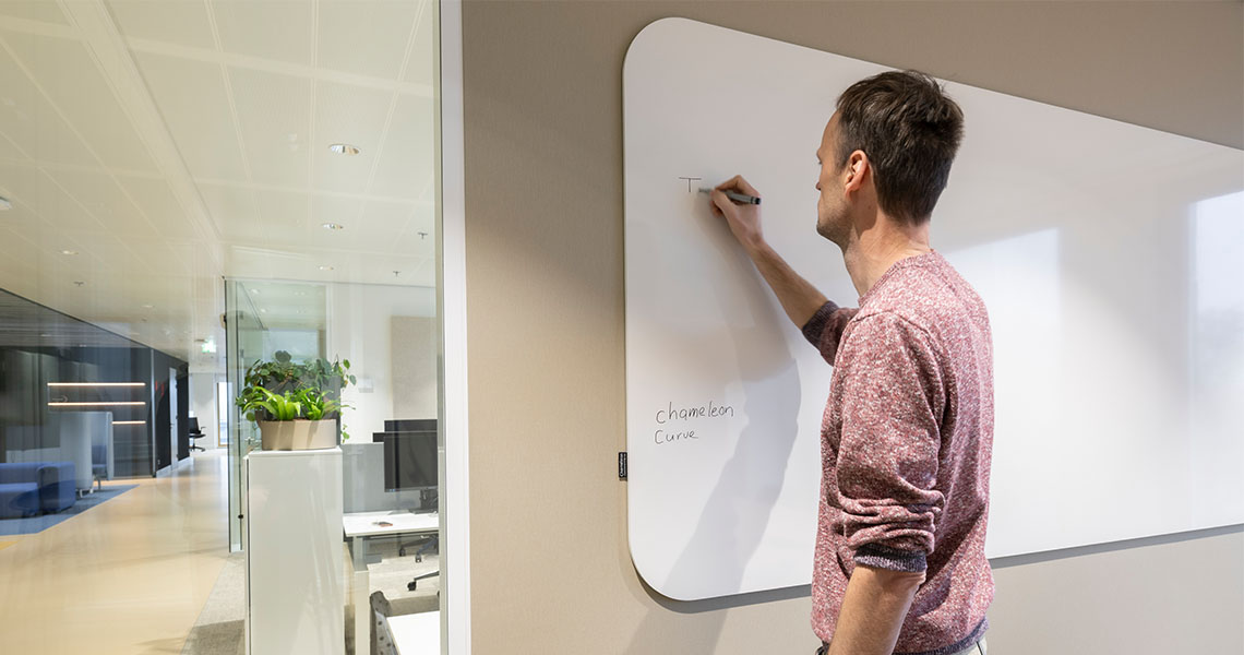 Design whiteboard mounted flush against an architectural wall