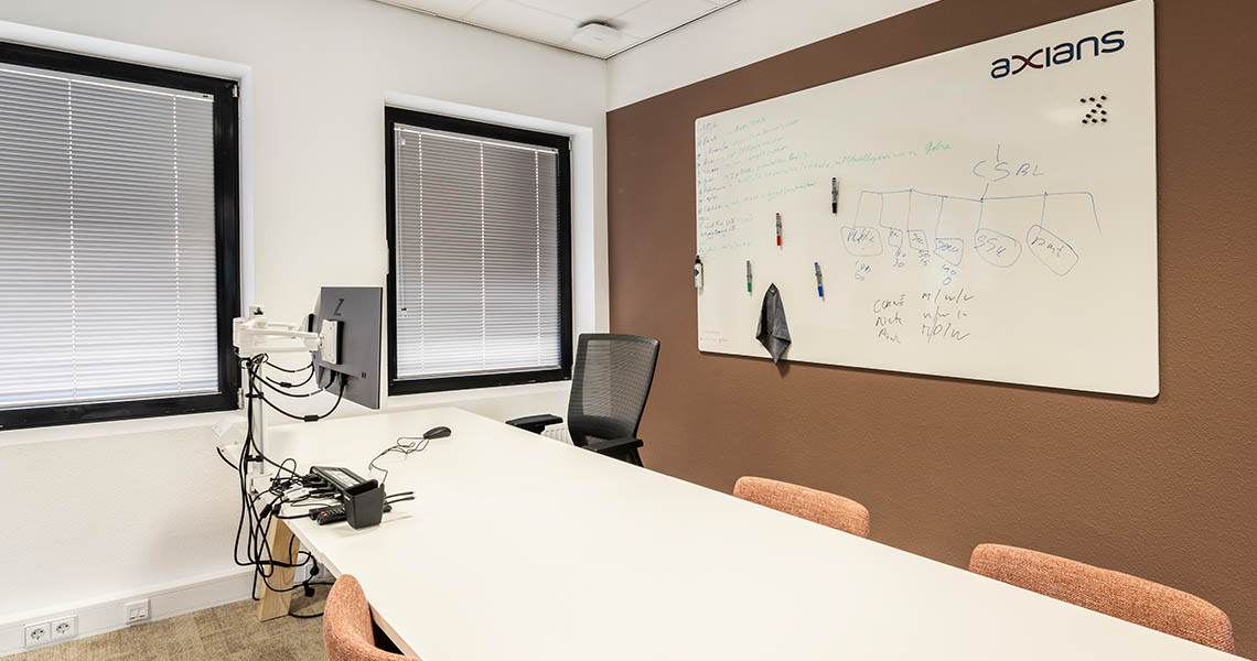 Large dry erase board in an informal collaboration corner