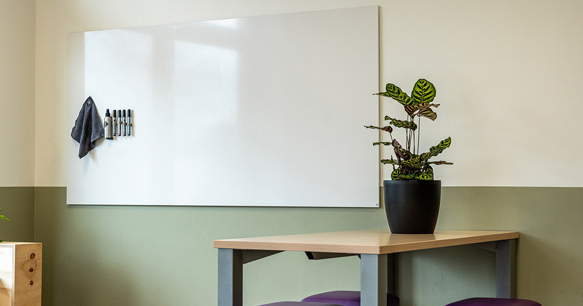 Large classroom whiteboard installed in a lecture hall or teaching space