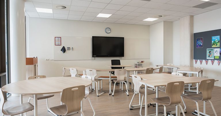 Large classroom whiteboard installed in a lecture hall or teaching space