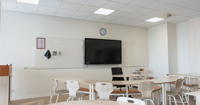 Large classroom whiteboard installed in a lecture hall or teaching space
