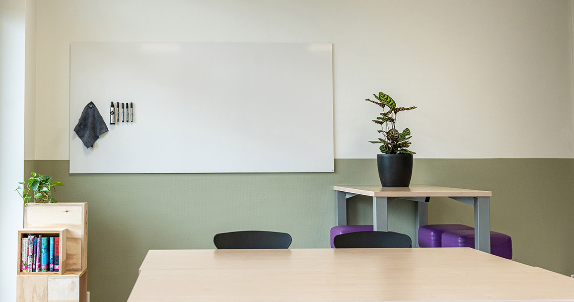 Large classroom whiteboard installed in a lecture hall or teaching space