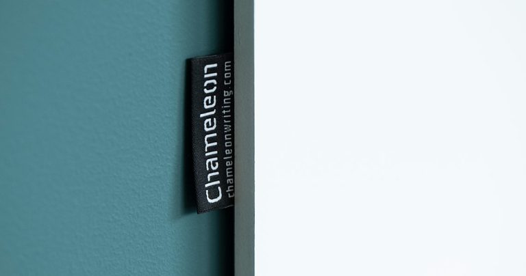Whiteboard wall installed across an office wall