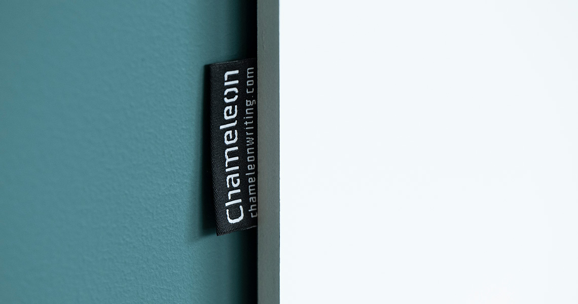 Whiteboard wall installed across an office wall