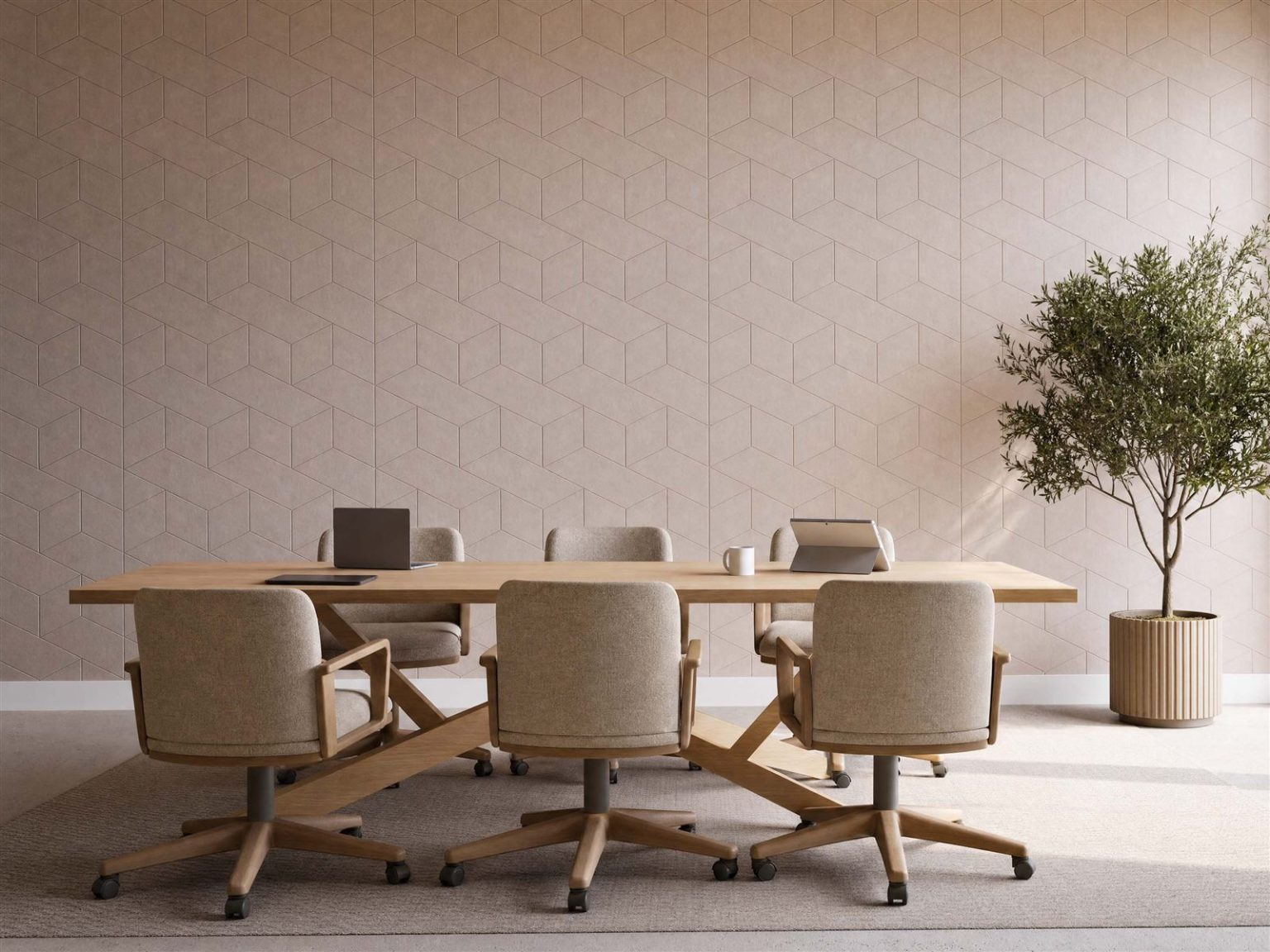 Acoustic wall panels in a diamond pattern in a wide boardroom