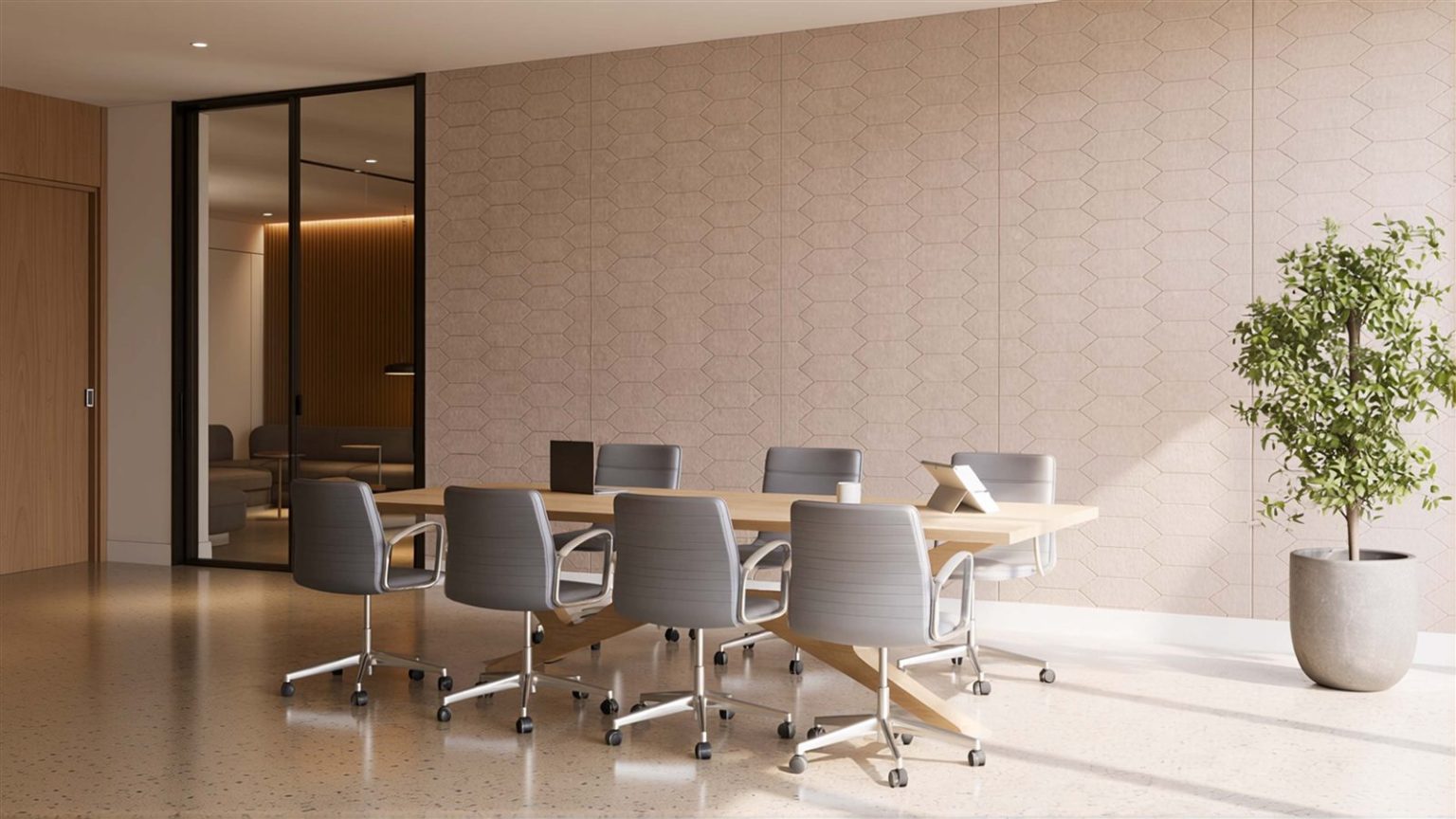 Acoustic wall panels in a hexagon pattern in an office hallway