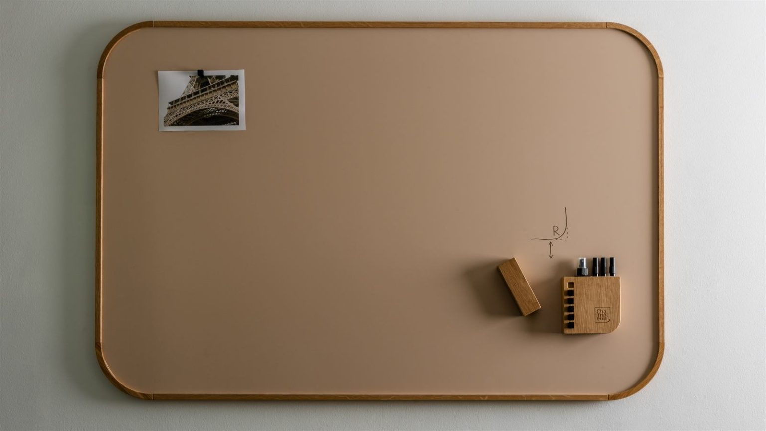 Chameleon Curve Oak whiteboard with rounded corners, photo and pen holder on the wall