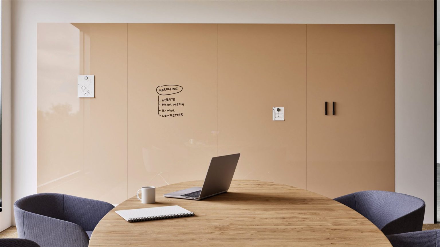 Glassboard wall panels: Sharp Glass Wall in beige, spanning four panels across a meeting room wall, with handwritten notes and magnetic memos attached, above a round table with a laptop and notebook.