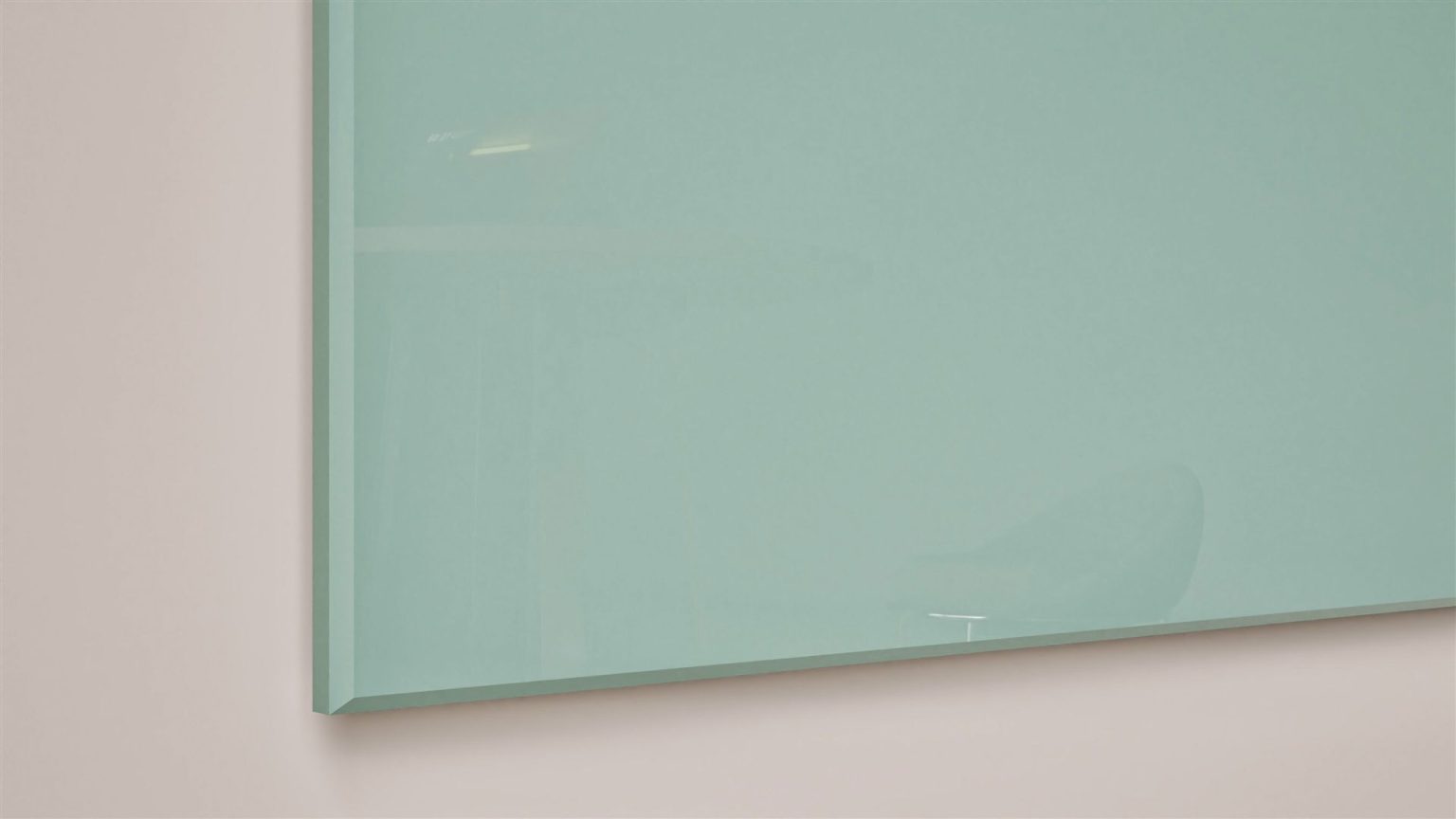 Glassboard panel: A close-up of a sage green Sharp Glassboard panel edge, showing the glossy tempered glass surface and finish.