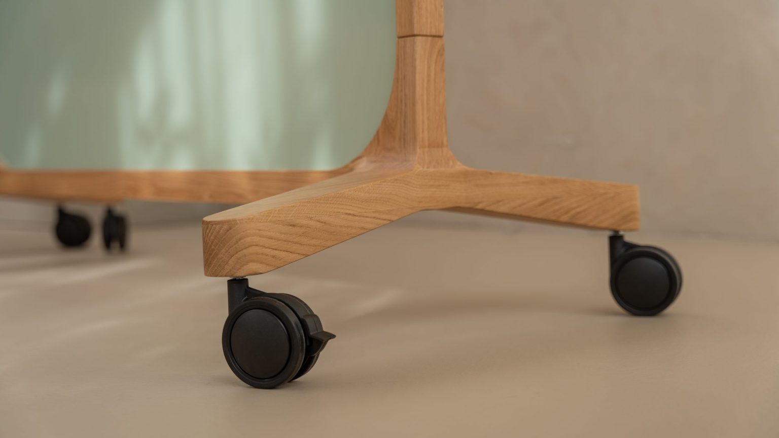Close-up of the wheels of a mobile whiteboard